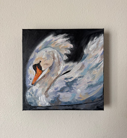 Painting of a swan on a beige wall